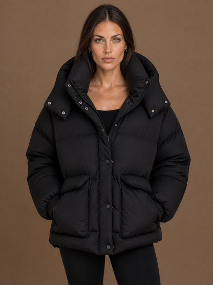 Women's Oversized Quilted Hooded Puffer Jacket with Storm Flap and Zip Pockets - Black
